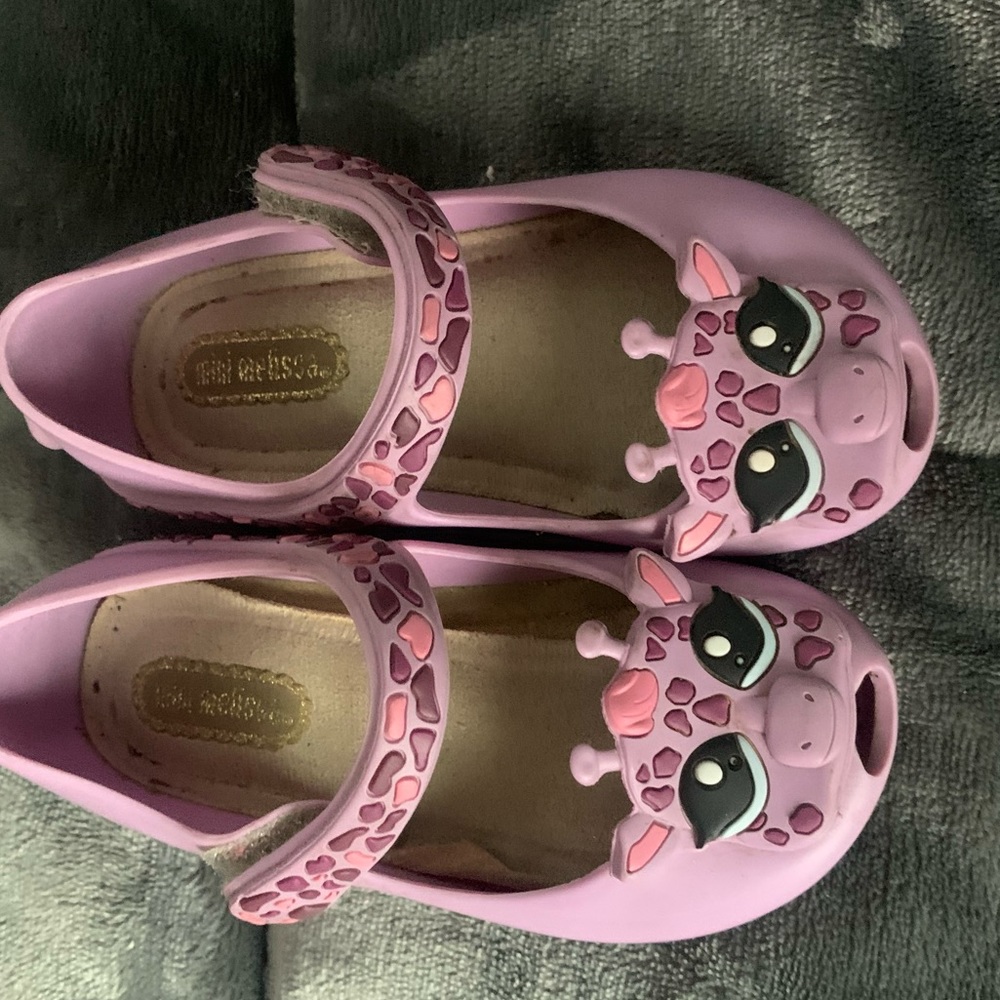 Gently used Mini Melissas size 7.